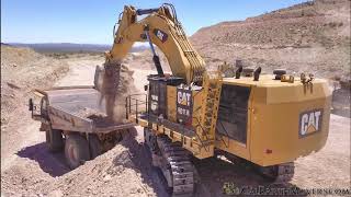 CAT 6015B Excavator Loading 100 Ton Haul Trucks [upl. by Zacks]